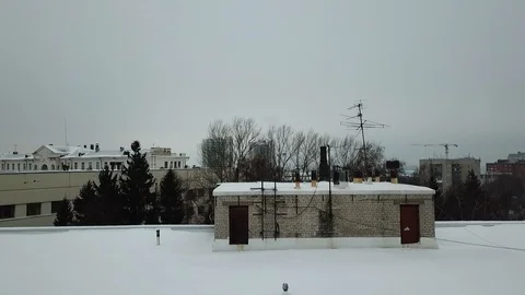 Gray building with large glass windows and an attic in winter Stock-Footage 111243152