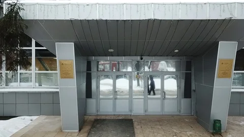 Gray building with large glass windows and in winter Stock-Footage 111243247