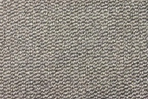 Gray carpet texture creating zig zag pattern Stock Photos