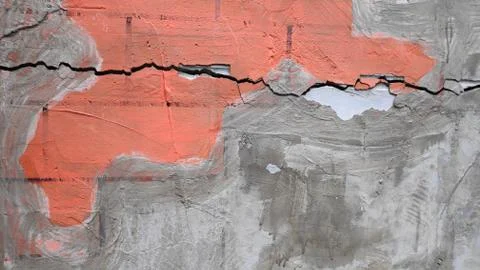 Gray cement concrete wall pattern with cracks on the surface as background Stock Photos