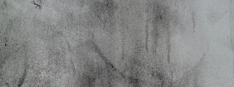 Gray cement plaster. Wall texture for background. Brush scratches on the wall Stock Photos