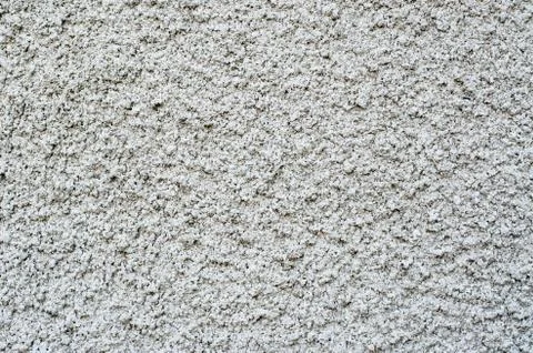 Gray cement surface as background. Part of the building facade with decorativ Stock Photos