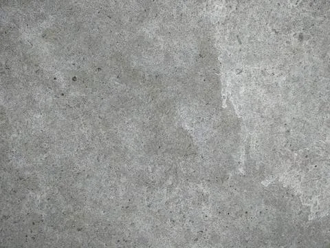 Gray cement texture with multiple chipping and drip of dried water. Stock Photos