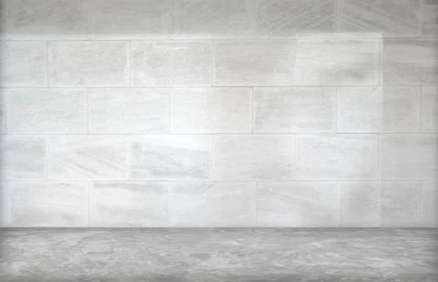 Gray cement wall in empty room with light and shadow. Stock Photos