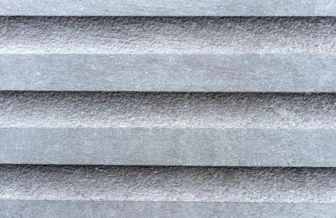 Gray ceramic tile with a rough textured surface. Cement tiles. Stock Photos