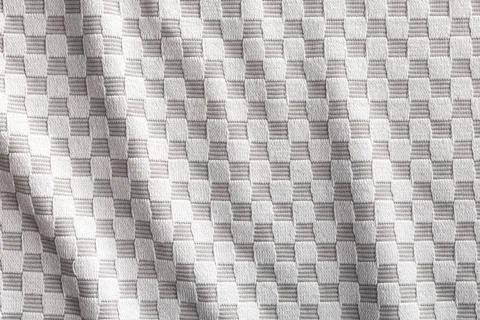 Gray checkered napkin. Tablecloth texture. Gray checkered napkin. Tableclo... Foto stock