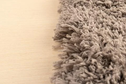 Gray chenille soft bath mat texture background. Bath Accessories. Top view. Stock Photos