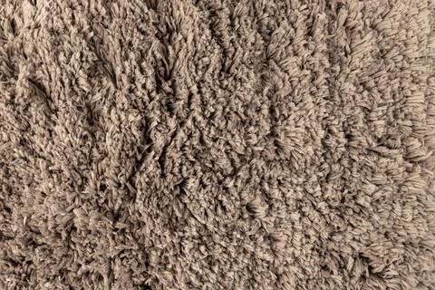 Gray chenille soft bath mat texture background. Bath Accessories. Top view. Stock Photos