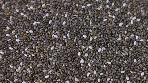 Gray chia seeds circle rotation close up top view Stock Footage 273721047
