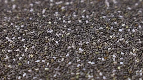Gray chia seeds circle rotation close up Stock Footage 274906832