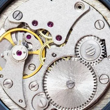 Gray clockwork of old mechanical watch watchmaker workshop - gray clockwor... Stock Photos