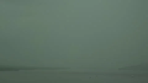 Gray cloud cover creates a subdued sky background in India Stock Footage 346502369
