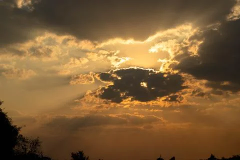 Gray cloud floating come to cover sun Stock Photos