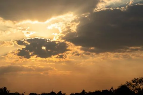 Gray cloud floating come to cover sun Stock Photos