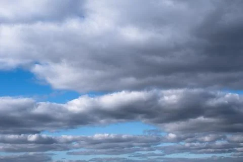 Gray clouds in the blue sky, cirrus Stock Photos