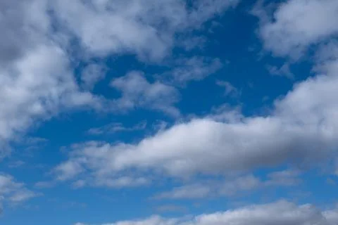 Gray clouds in the blue sky, cirrus Stock Photos