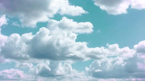 Gray clouds float across the blue sky. Time laps. Stock Footage 142081335