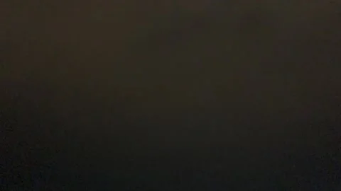 Gray clouds float across the night sky Stock Footage 169762653