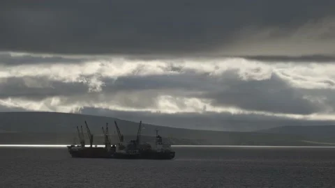 Gray clouds float over the sea and the ships. Stock Footage 142846334