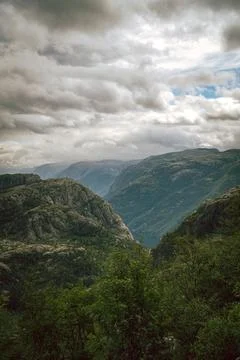 Gray clouds over the mountains Stock Photos