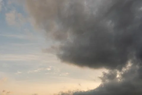 Gray clouds. The sky before the rain and thunder. blue sky over gray clouds Stock Photos