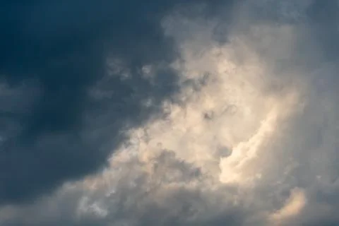 Gray clouds. The sky before the rain and thunder. Through the gray rain cloud Фото