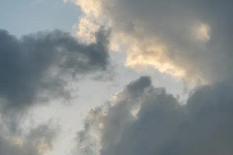 Gray clouds. The sky before the rain and thunder. Through the gray rain cloud Фото