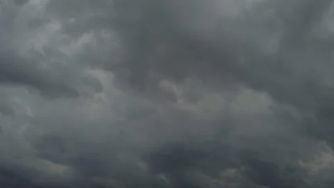 Gray clouds sweep quickly across the sky in anticipation of a thunderstorm Stock Footage 228018502