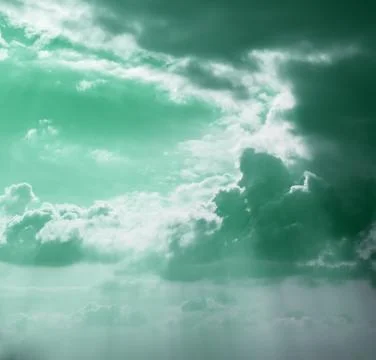 Gray clouds tinted in the green Stock Photos