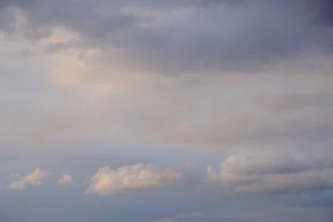 Gray cloudy sky as background. Dramatic sky. Stock Photos