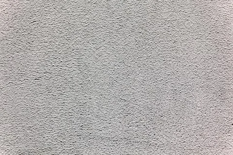 Gray colored plaster wall background Stock Photos