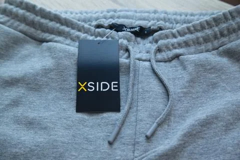 Gray colored Xside brand S size sweatpants detail and price tag, Istanbul Turkey Stock Photos
