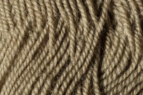 Gray colored yarn wool closeup background texture Stock Photos