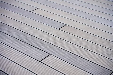 Gray composite decking boards on outdoor terrace Stock Photos