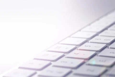 Gray computer keyboard seen in extreme close-up with the letters on the tuches Stock Photos