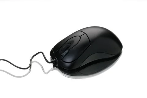 Gray computer mouse with cable and reflection, on white background. Stock Photos