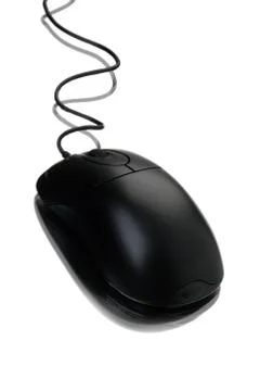 Gray computer mouse with cable and reflection, on white background. Stock Photos