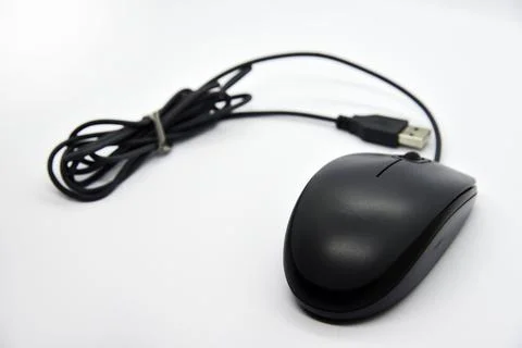 A gray computer mouse on a white background. Beautiful shiny computer mouse.. Stock Photos