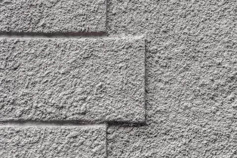 Gray concrete background with rectangular ledges. Stock Photos