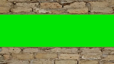 Gray concrete block walls move up and down to reveal a green clean background. 3 Stock Footage 311720867