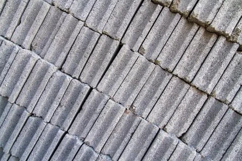 Gray concrete construction block wall Stock Photos