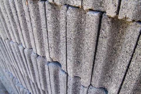 Gray concrete construction block wall Stock Photos
