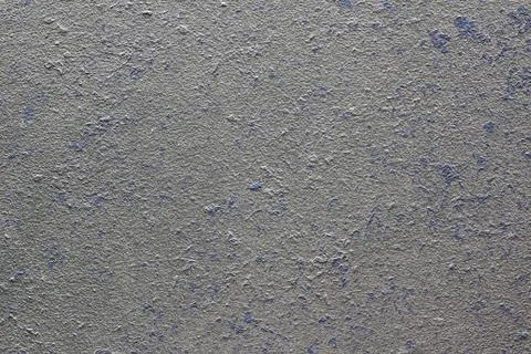 Gray concrete with lavender embedding. Background Foto stock