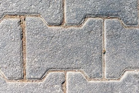 Gray Concrete Pavers with Interlocking Pattern Stock Photos