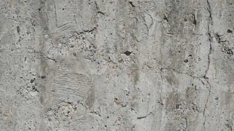 Gray concrete wall with cracks texture. Фото