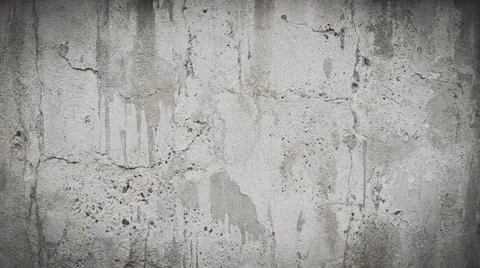 Gray concrete wall with cracks texture. Fotos Stock