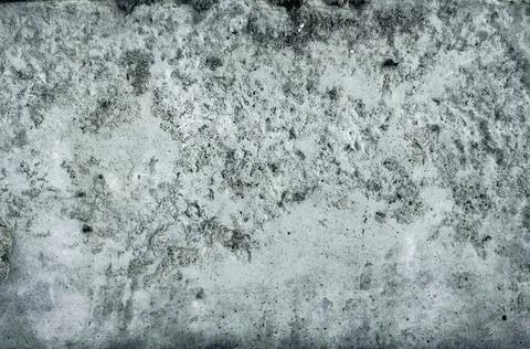 Gray concrete wall, old surface with peeling plaster. Building board texture. 스톡 사진
