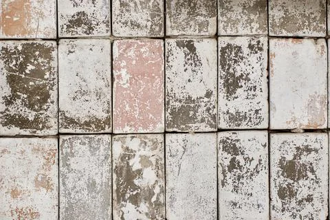 A gray concrete wall with a pattern of squares. background, texture Stock Photos