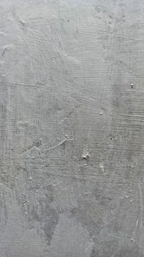 Gray concrete wall with rough texture and subtle wear Stock Photos
