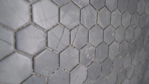 Gray concrete wall with seamless hexagonal tile pattern on kitchen backsplash. Stock Footage 308202554